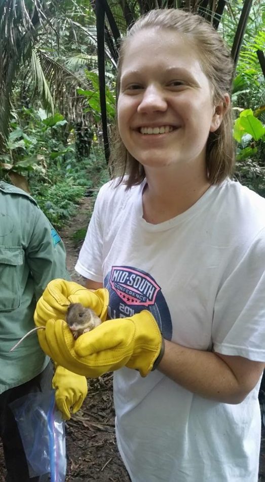 Students learn to safely remove small mammals from sherman traps.