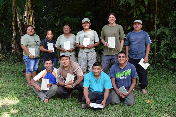 BFREE staff with Belize Cacao Agroforestry Handbook